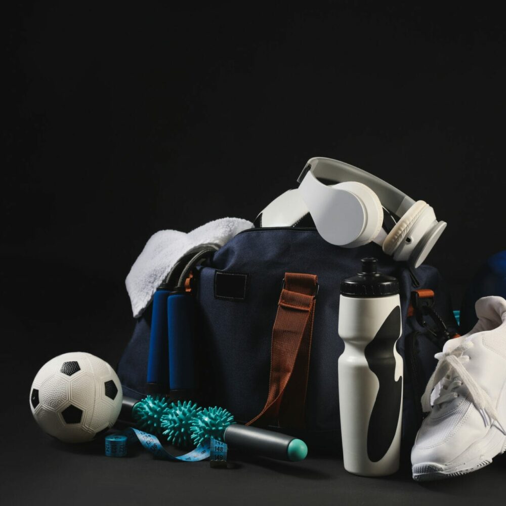Set of sport equipment on dark background